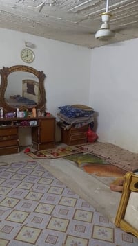 بيت تجاوز للبيع بغداد الحسينيه صب ع شارع العام سايدين ب٢٨بصف السوك الج...