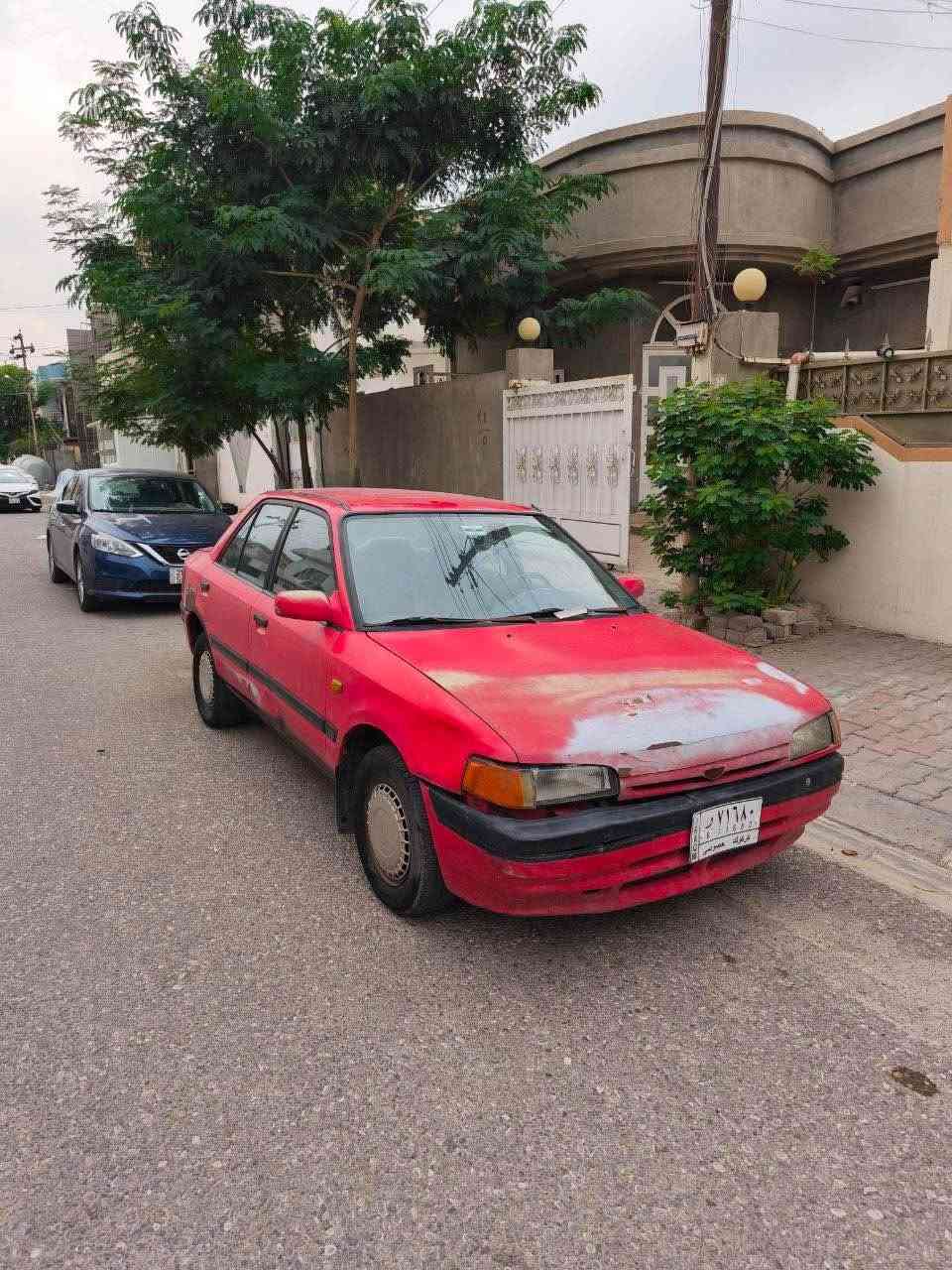 مازدا ٣٢٣ • اوتوماتيك • رقم كركوك