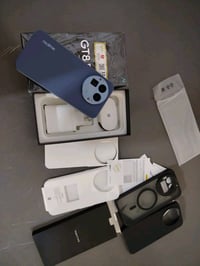فلاكشب ريلمي gt 8 pro  بضمان سنة من شركة الوطني ذاكرة 512 مع كافة ملحق...