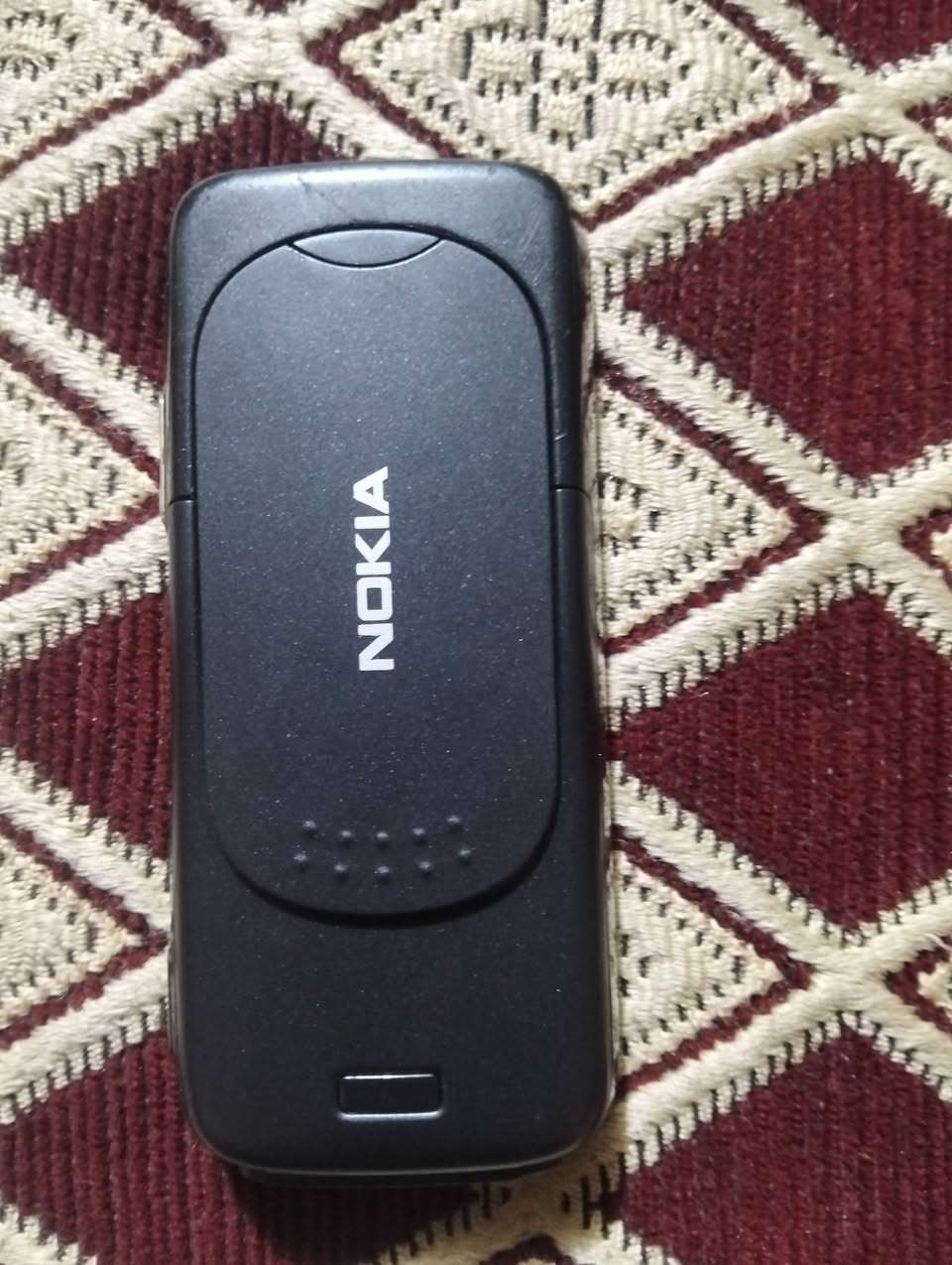 ٧٣ • بطارية أصلية • شاحن أصلي