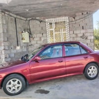 بروتون ٢٠٠٤ • انكليزي • رقم بغداد