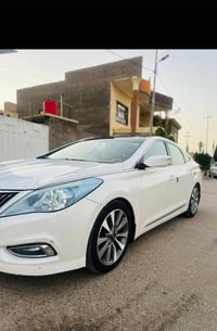 ازيرا ٢٠١٤ • مكينة ٣٠٠٠ • رقم بغداد