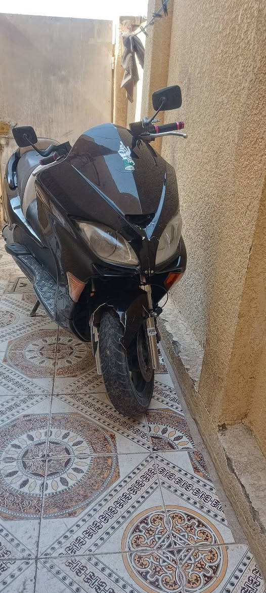 دراجه فورزه 09 مكفوله من مكينه وضفيره الرقم 0775642476
