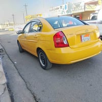 اكسنت • ٢٠١٠ • توماتيك