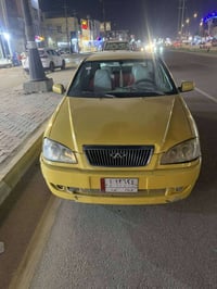 سياره شيري كوين موديل 10 مصفره هيئه غرامات عليها ٣٠٠ينزل من سعرها محرك...