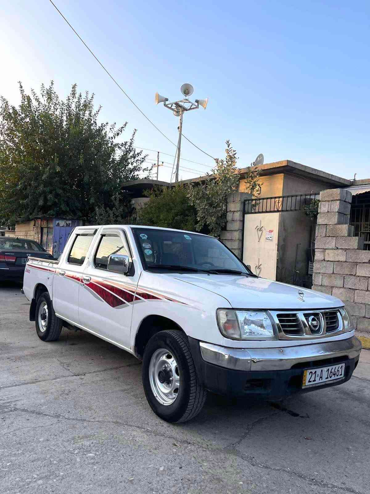 نيسان محسن • قفل مركزي • ٢٠٣٠