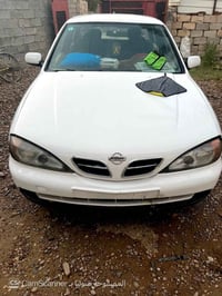 نيسان سني ياباني موديل 2001 رقم بغداد بسمي تحويل جديد رقم نكليزي يساره...