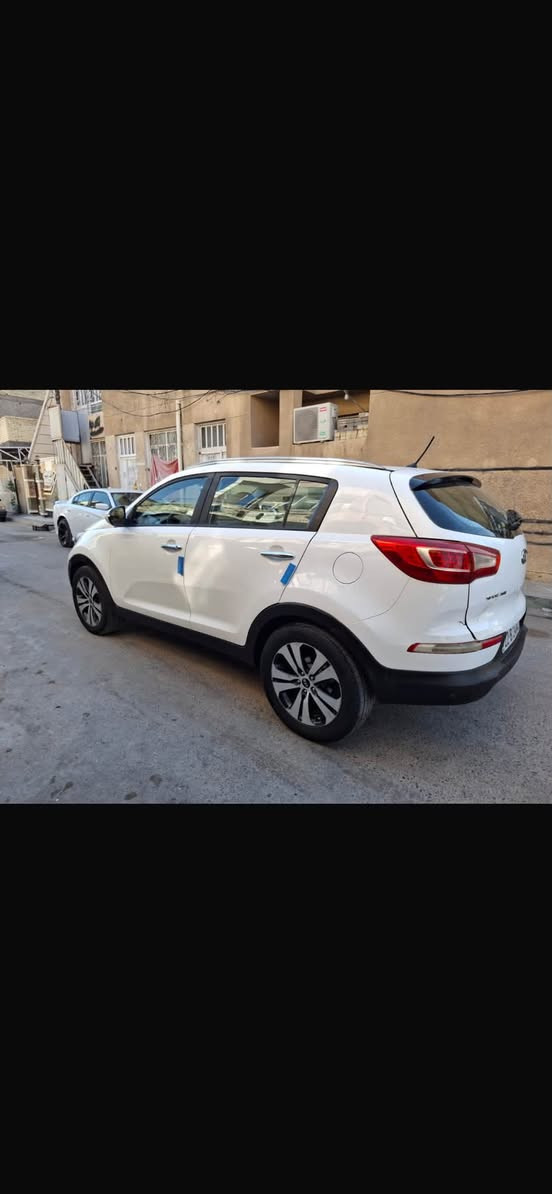 اسبورتج موديل ٢٠١١ خليجي
السياره مصبوغه عام فقط الجولغ السدر والباب والباب الخلف مامصبوغات 
مكينه كير حداده حلوات 
رقم اربيل أنكليزي وهزه جديده سنويته لل٣٠ يله تنتهي 
تريد مداور تريد وكاله حاضر 
مكان السياره ذي قار 
للبيع او المراوس بسياره حديثه ناصيه 
سعره 87 ورقه 
للستفسار ***********
