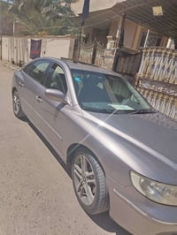 رقم بغداد • باسمي • حزام تجميلي