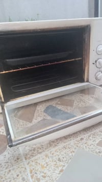 فرن مستعمل • خبطه بسيطة • حرارة قوية