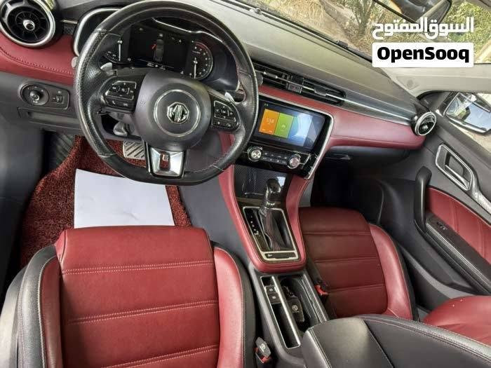 MG 6 THROGHY 
MG6 الفول مواصفات
مرقم بصره بأسمي رقم دولي 
عداد المسافة 32 الف كيلو
محرك 1.5 تيربو
ناقل سرعة دبل كلتش 7 سرعات
قوة المحرك 169 حصان
عزم الدوران 250 نيوتن / متر
مصابيح نهارية LED
مصابيح خلفية LED
مرايا كهربائية
اشارات في المرايا الكهربائية
مرايا قابلة للطي بشكل الكتروني
مقود جلد
مكابح توقف الكترونية EPB
مكابح انتظار الكترونية Auto Hold
نظام الثبات الالكتروني ESP
نظام توزيع قوة الكبح EPD
نظام مكابح المنعطفات CBC
نظام مراقبة ضغط الهواء في الاطارات
تكييف الكتروني ثنائي المنطقة
نوفذ كهربائية مع فتخ واغلاق اوتوماتيكي
مثبت سرعة
ناقل سرعة في المقود ( بادل شيفتر )
بصمة
مسند يد خلفي مع حامل اكواب
مقود قابل للتعديل
شاشة 8 انش مع كاميرا
بلوتوث
مداخل USP مع شاحن
مداخل كهرباء 12 فولت
Android Auto
Apple Car Play
تحكم بالمقود
حساس خلفي
شاشة عدادات 3.5 انش
عادم مزدوج ) دبل اكزوزت ( فتحة سقف
دوسات بنزين وبريك معدنية رياضية
جنط 18 المنيوم
اطارات بروجستون
مقاعد جلد
مقعد سائق كهربائي ب 6 حركات
6 وسائد هوائية
نوفذ كهربائية مع فتح واغلاق اوتوماتيكي لجميع
النوافذ
نظام الاضاءة التلقائية
اغلاق النوافذ تلقائيا عن قفل السيارة

ضمان 6 سنوات او 200,000km ايهما اقرب

التواصل على الرقم ***********

نص مكتوب في الصور:
- السوق المفتوح OpenSooq