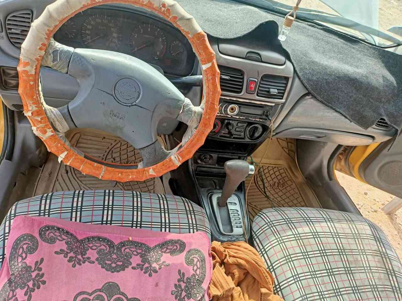 صني • ٢٠٠٢ • مصبوغ ابيض