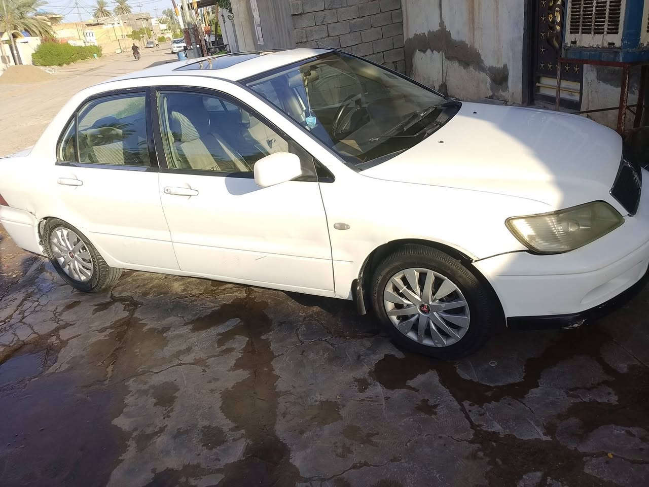سلام عليكم لانسر موديل 2001 كير محرك كفاله صبغ عام للجماليه تبريد فول رقم بغداد مشروع وطني بسمنه السياره مكان ديالى شهربان السعر 60 وبيها مجال الهاتف ***********
