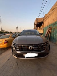 توسان للبيع وارد أمريكي لون إسمنتي فئة ال sel موديل 2025 ماشيه 22الف م...