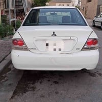 لانسر ٢٠٠٥ • محرك وكير مكفولات • كربلاء