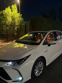 كورلا هايبرد موديل 2022  ماشيه 90 الف وبيه ملاحضات  موضحه بلصور  موصفا...