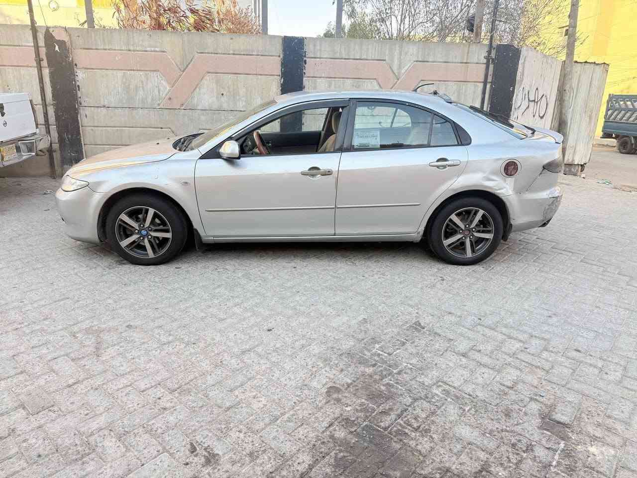 مازدا ياباني وارد خليجي اوتماتيك 
زوم 6 موديل 2003 محرك 2000 
رقم بغداد 
سيارة بلادية بدون صبغ 
محرك كير خير من الله
مشط ستيرن جديد 
كهربائيات كلهة شغالة
تبريد شغال 
مكانهة بغداد 
سعر 44 
هاتف ***********
