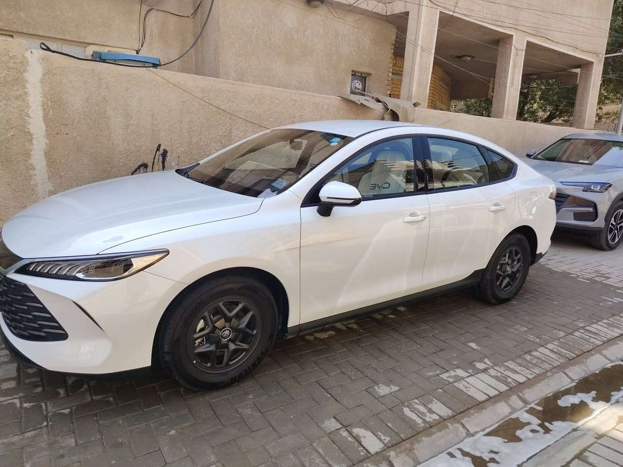 ✅✅بي واي دي  BYD Qin Plus   داخل أبيض
✅✅سنة الصنع 2025  ماشية 2000كم وقابلة للزيادة 
✅✅حجم المحرك 1500cc 
✅✅بطاريه ليثيوم شفرة byd 
سيارة سيدان مدمجة بنظام هايبرد PHEV 
✅✅تجمع بين محرك بنزين هايبرد   بلكن ومحرك كهربائي
✅✅ بطارية ليثيوم شفرةbyd تدعم الشحن السريع
✅✅ شاشة   إنش بنظام ملاحة وتحديثات OTA
✅✅ نظام صوتي بـ6 مكبرات صوت + ميزة الكاريوكي
✅✅ حساسات وكاميرا خلفية – مثبت سرعة – مقاعد جلد 
✅✅ تصميم خارجي عصري بمصابيح LED ومقصورة عازلة للصو
✅✅اوتو ستوب
✅✅حساس خلفي 
✅✅اوتو هولد AUTO HOLD 
✅✅هند بريك بصمه 
✅✅تشغيل السياره بصمه مع
 كارت دخول ذكي
✅✅مقاعد جلد 
✅✅لايت زينون 
✅✅لد نهاري LED
✅✅بك لايتLED
✅✅3انضمة للقيادة 
✅✅مانع تزحلق
✅✅مثبت سرعه  Cruise 
✅✅تشغيل عن بعد 
✅✅شاشة ذكية
✅✅ سعة الخزان 65لتر   اتمشيك 2100 كم
مكاني بغداد الزعفرانية الاتصال واتساب 
***********

نص مكتوب في الصور:
- 12:03 ص
- 12:04 ص