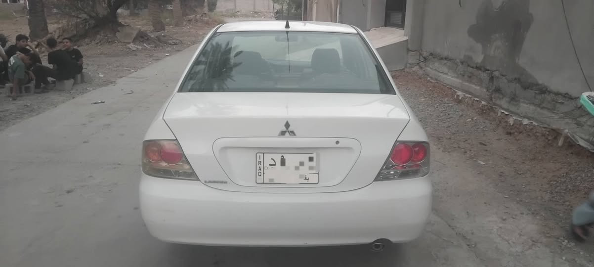 السلام عليكم لانسر ٢٠١١ بيه صبغ الباب الخلفي وره السايق رقم بغداد السياره باسمي تحويل ثاني يوم ***********
