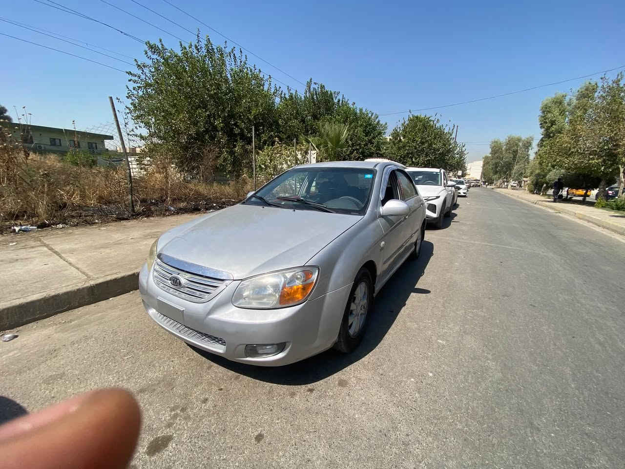 ‏سلام عليكم عندي كيا سيراتو لون سلفر مصبوغ سبغ عام بدون ضرر بسبب التقيل موديل 2007 محرك قير شرط وطخم شرط شرطة التبريد ناقصة بس غاز محرك 16 أربعة سلندر ودوشمه  نظيفة بها شاشة وكاميرا خلفية طقم تواير نظيف وشرط التحويل ثاني يوم وما بيها نوا قص ومكانها بل موصل هذا الرقم للاستفسار ***********
