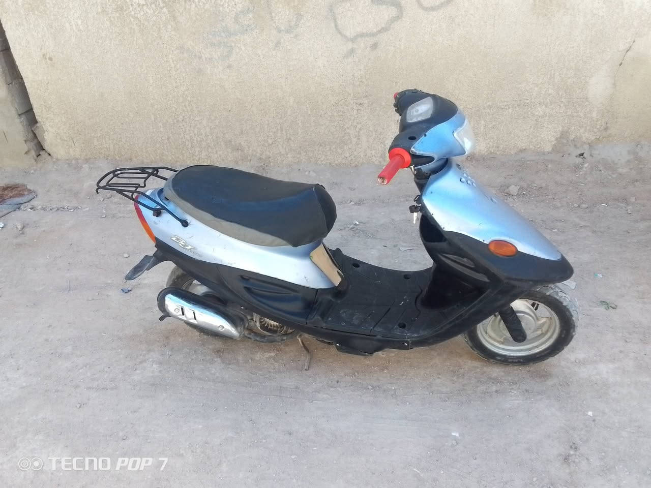 دراجه تسع زروف شغاله من كلشي كهربائيات وسحب قوي ونهضه قويه السعر 250 تشتغل بس هندر مكاني البصره المطيحه رقمي للتواصل ***********

نص مكتوب في الصور:
- TECNO POP 7