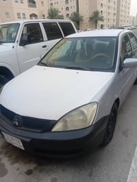 لانسر مسبوشي موديل 2009 بيهه صبغ حزام بيهه جاملغ الأمامي بدل ضربه جامل...