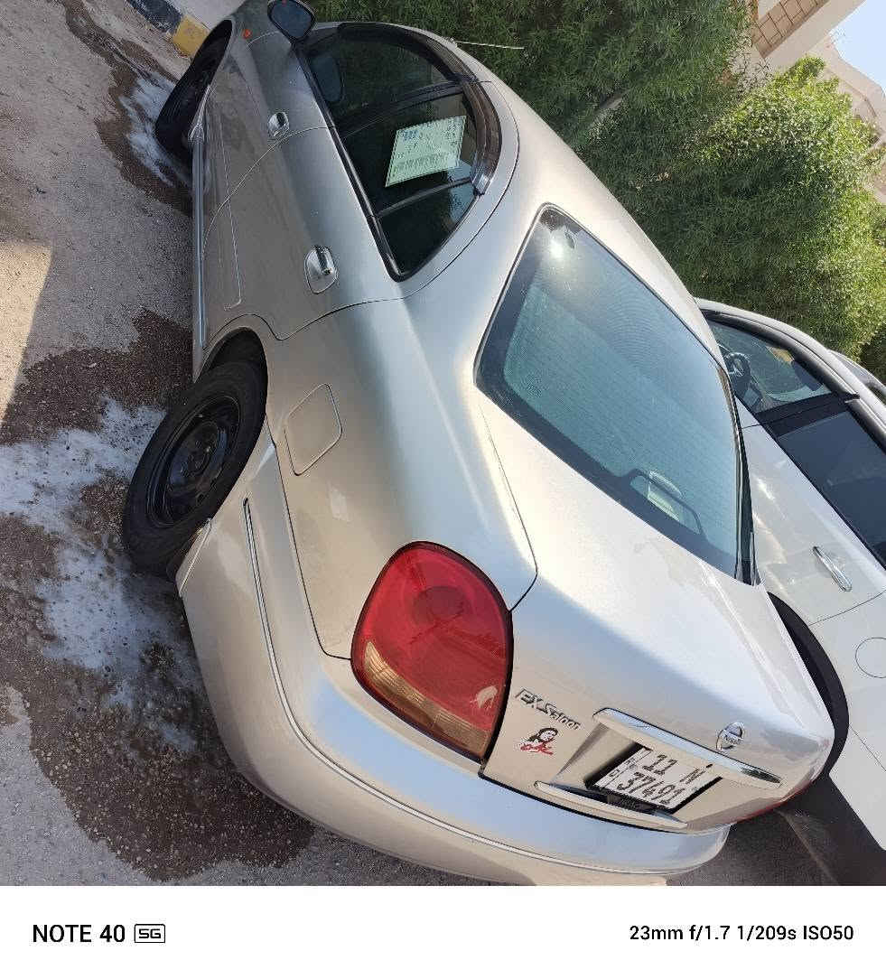 للبيع نيسان صني ياباني
 موديل 2009 رقم بغداد الجديد بسمي
 مكينه 1600 قبق اسود
 فول أوتوماتيكي
 كير ومكينه وحداديه وتبريد مكفولات
 سعرها 80 وبيه مجال
 مصبوغه عام للجماليه 
اللون رصاصي يعني سلفر
 السياره بالحله بحي الزهراء يم جسر الام 
***********  *********** حلة, بابل

نص مكتوب في الصور:
- NOTE 40 5G 23mm f/1.7 1/289s ISO50
- NOTE 40 5G 23mm f/1.7 1/210s ISO50
- NOTE 40 5G 23mm f/1.7 1/281s ISO50
- NOTE 40 5G 23mm f/1.7 1/209s ISO50
- NOTE 40 5G 23mm f/1.7 1/25s ISO4337
- NOTE 40 5G 23mm f/1.7 1/20s ISO5212
- NOTE 40 5G 23mm f/1.7 1/20s ISO4753
- NOTE 40 5G 23mm f/1.7 1/25s ISO2879