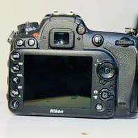 نيكون D7100 • شاحن • بطارية