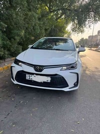كورلا هايبرد 2024  فول الفول داخل جلد احمر و كرسي كهرباء  ماشية 22 الف...