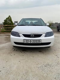 مازدا 320 • ٢٠٠٣ • تحويل خصوصية