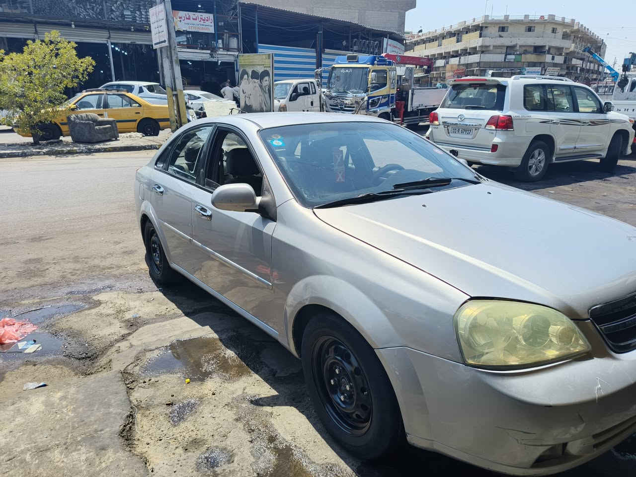 ٢٠٠٦ مصبوغه سياره حزام 
رقم التلفون ***********
سعر ٥٥ بيها مجال
