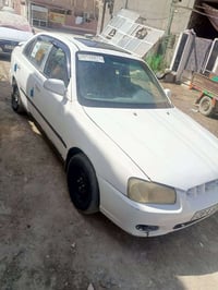 اكسنت • ٢٠٠٠ • رقم نجف