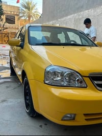 � للبيع سيارة شيفروليه أوبترا – أصفر شركة عامة 🚘 🔸 بيها تبديل قطعتين أ...