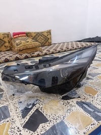 لايت النترا • ٢٣ • عدسات كوري