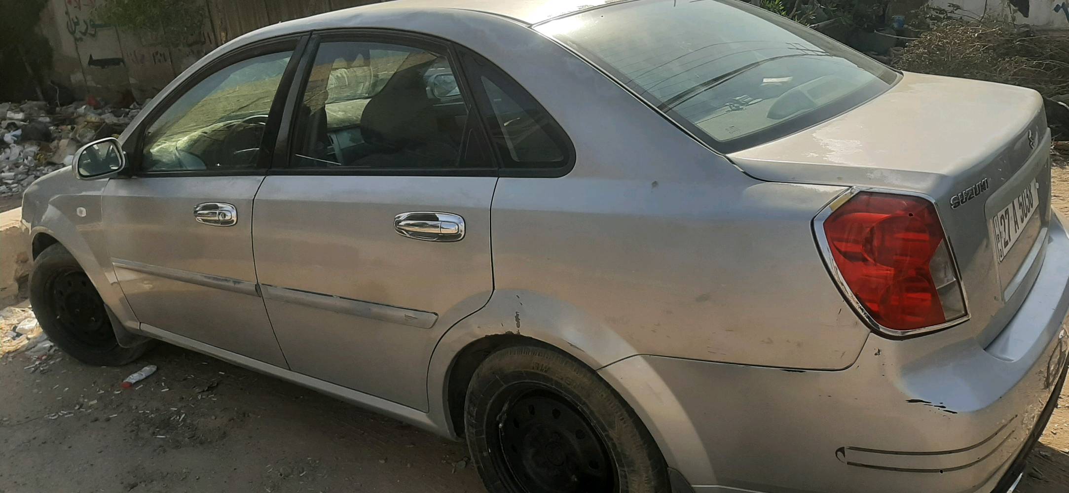 فورنزا موديل ٢٠٠٧ مكينه وكير خير من الله تبريد شغال السياره بسمي تحويل ثاني يوم السياره عوزه صبغ فقط والصدر الخلفي ٥٠% مكاني بغداد ***********