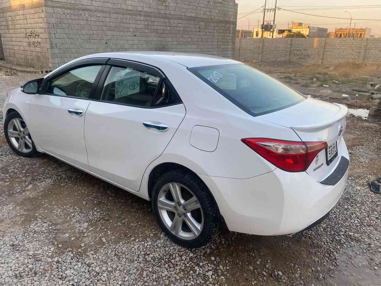 كورلا ١٧ كندي رقم أربيل سنويه ٢٠٢٩ ضررها باب السكن مبدل بلادي وباب خلف السكن بلادي مصبوغ بدون دواخل بدون ايرباك تكم شرط سليمه السياره ماشيه ١٤١ الف ميل بيها رصعات بمقدمة القماره الباقي مكفول محرك حجم ١٨ والكير والمحرك بالشرط بدون تبخير او تنقيص السعر ١٢٨ وبيها مجال بسيط *********** مكان السياره كركوك اخوان ما انطي كلام لشخص ابيع السياره لأول شخص يجي ايشوفها لان اكو أشخاص ياخذ مني كلام وما ايخليني ابيع السياره لغير شخص وبالآخير ما يجي

نص مكتوب في الصور:
- SAM بوياخ ساردە كوت گۆراو بۆراوی بلاد پارچە لە كاتی بردن و برون یاخود دەسكاری كردنی بەهەر شيويەيك ئيمه بەرپرس نين چال و شوخت و ريفتە بەرچاويه شفرت نيه بژاوە فەحس ناكەين گرانفوە و گوراو جبارازی نە  ژير لە ژكە دیاری ناكريت اژی - پيشانگای محمد باجەلان