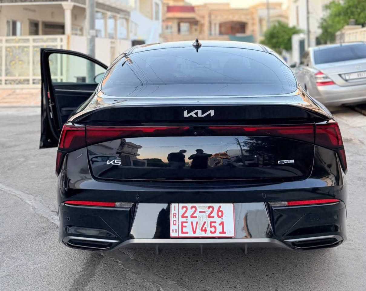 🚘 للبيع | كيا K5 GT-Line موديل 2025
السيارة بدون رقم — تترقم شمالي

🇺🇸 الوارد: أمريكي
🔧 الضرر: خفيف جداً، فقط حافة الجاملك الأمامي ومصبوغ
✅ بدون دواخل
✅ بدون فتح إيرباك

⚙️ المحرك: 2.5 GDI تنفس طبيعي
🛣️ الممشى: 19 ألف مايل فقط

المواصفات:
🔹 فئة GT-Line بدون بانوراما
🔹 شاشة 12.3 إنچ + نافيگيشن
🔹 أبل كار بلاي + أندرويد أوتو
🔹 شاحن لاسلكي
🔹 مقاعد جلد SynTex
🔹 كرسي السائق كهربائي
🔹 تدفئة كراسي أمامية
🔹 تشغيل بصمة + تشغيل عن بُعد
🔹 رادار ومثبت سرعة ذكي
🔹 نظام النقطة العمياء
🔹 المحافظة على المسار
🔹 حساسات أمامية وخلفية

💵 السعر: 182 ورقة — مجال بسيط جداً للجاد
📍 الموقع: أربيل

📞 للاستفسار:
*********** — واتساب
***********

🔢 رقم الشاصي:
KNAG64J74S5281013
