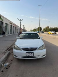 كامري • ٢٠٠٤ • باب مصبوغ