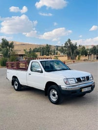 نيسان تاك • ٢٠٠١ • ٤ تاير جديد