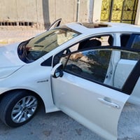 كورلا للبيع موديل ٢٠٢٤ اللون ابيض مواصفات فتحه بصمه حساسات أمامي خلفي ...
