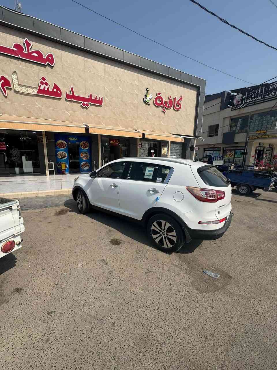 سبورتج 2013 سياره جديده كلش. مال جناي. بيه. جاملغ يمنه بي شويه رش وخلفي بي كارت تحويل مباشر او وكاله. مكان شوملي.  سعر ١٢٣ وبيه مجال ***********
