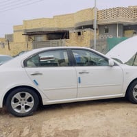 اوبتيما ٢٠٠٩ • محرك ٢٠٠٠ • فول اوبشن