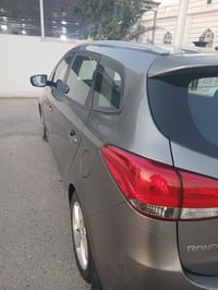 كيا ريندو 2014 نص مواصفات  3 قطع صبغ  دعاميات صبغ فقط  رقم بغداد بسمي ...
