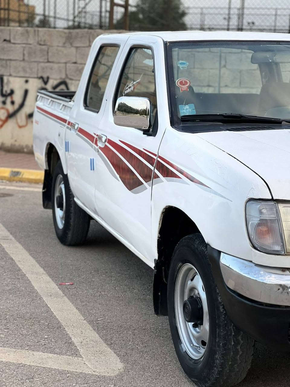 نيسان بيكاب • ٢٠٠٢ • قفل مركزي