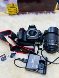 نيكون D7100 • عدسة ١٨-١٠٥ • شاتر ٢٠٨٧١