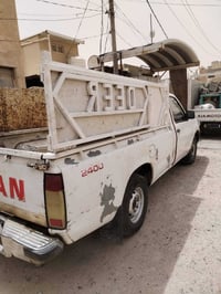 نيسان بيكاب • ٢٠٠٢ • نجف