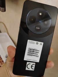 Redmi 14C، ويظهر على الملصق رقم الموديل 2409BRN2CC، كما أن السعة المكت...