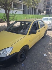لانسر بومه • مكينة ٢٠٠٠ • ٢٠٠٨