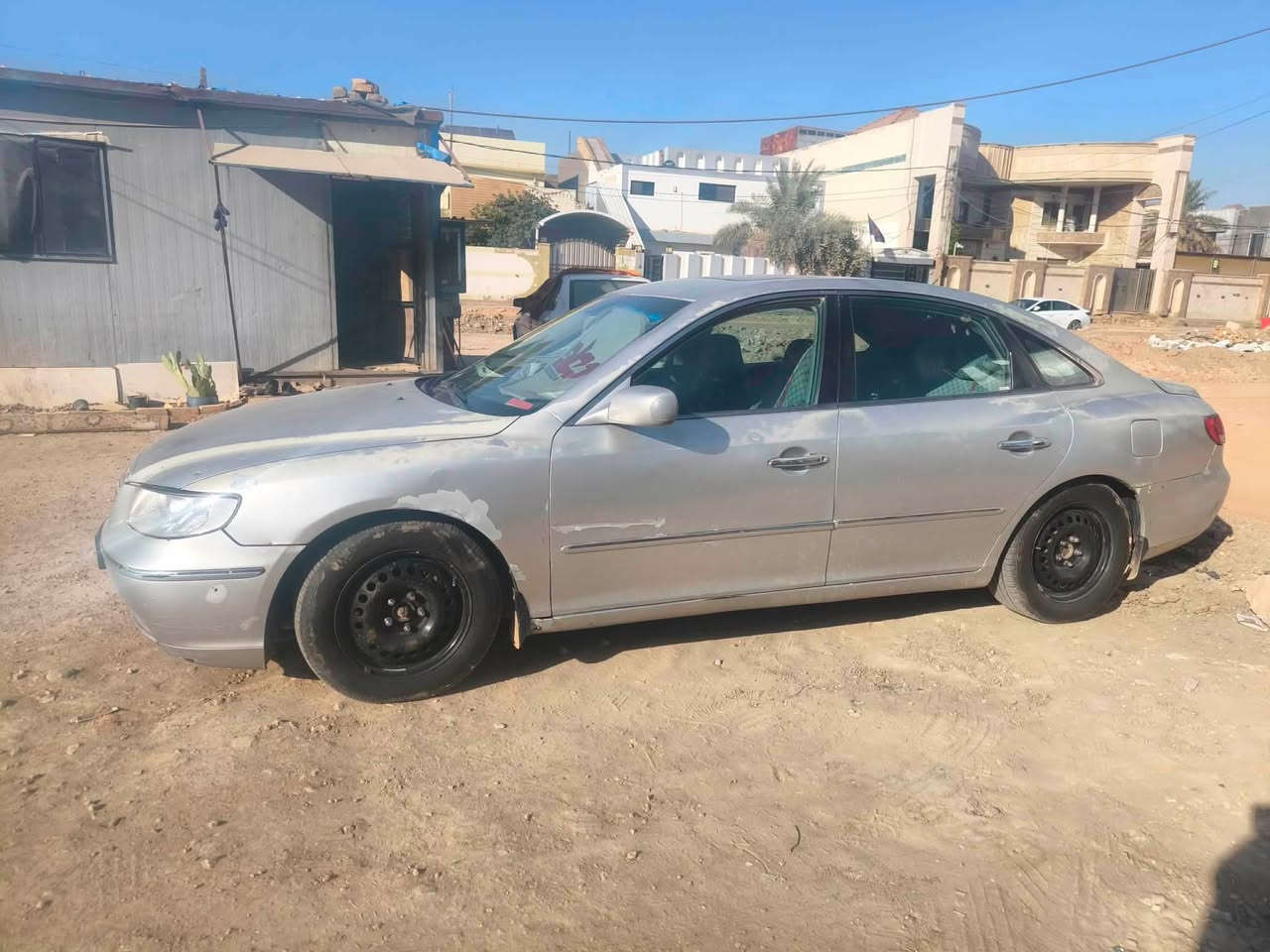 ازيره وارد امريكي موديل 2006السياره فول 1/1رقم بغداد بأسمي تبريد منضومه جديده شاد بيهة ضربه بلجاملغ الورة اتصل ***********
