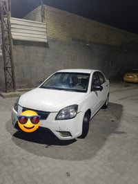 كيا ريو 2012 رقم بغداد محرك 1600  السعر 82ورقه رقم الهاتف 07727406610